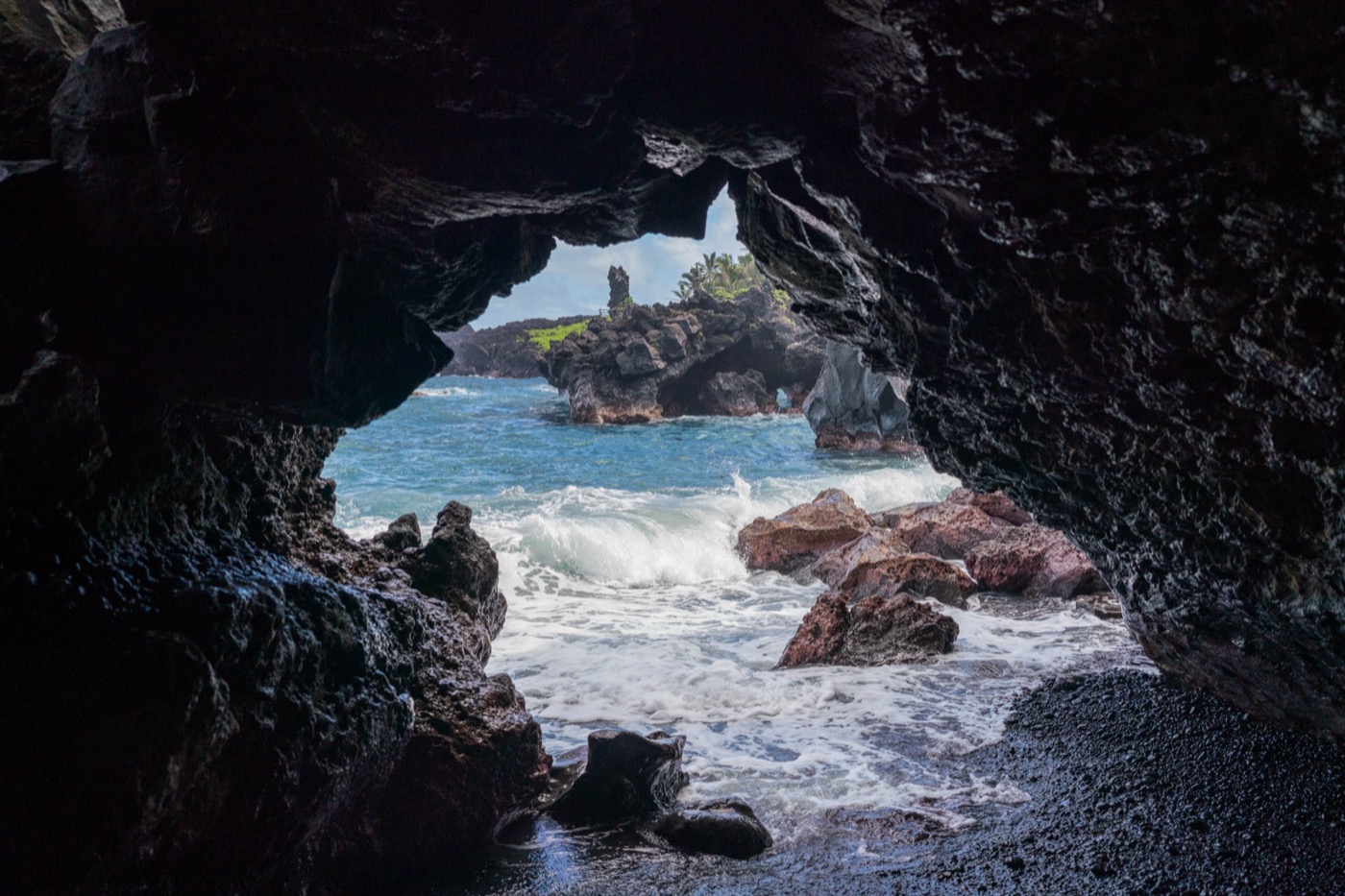 Maui black sand ocean cave coastal wall art metal print